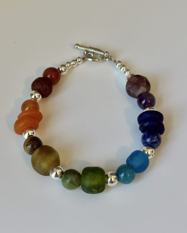 A bracelet with many different colored stones